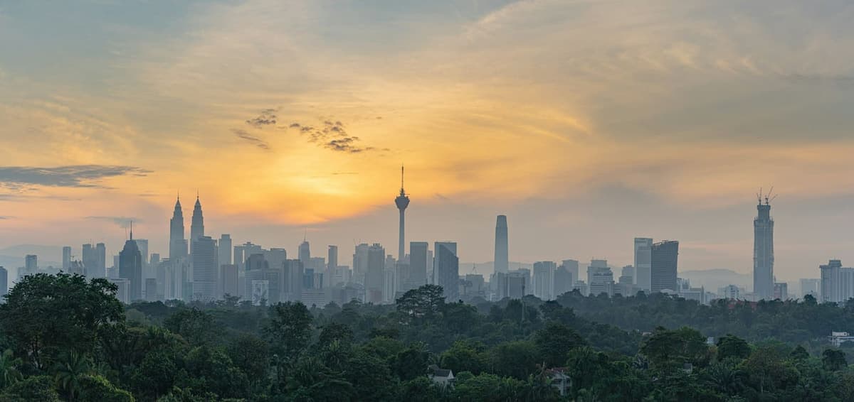 DMC in Malaysia: Kuala Lumpur skyline at sunset