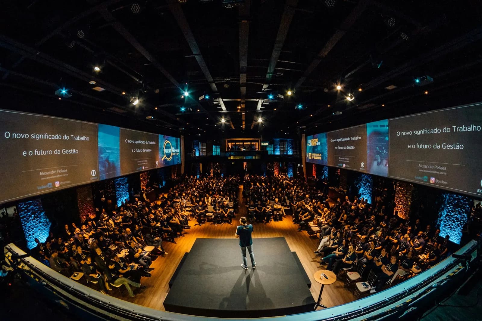 A speaker addressing delegates at a business conference