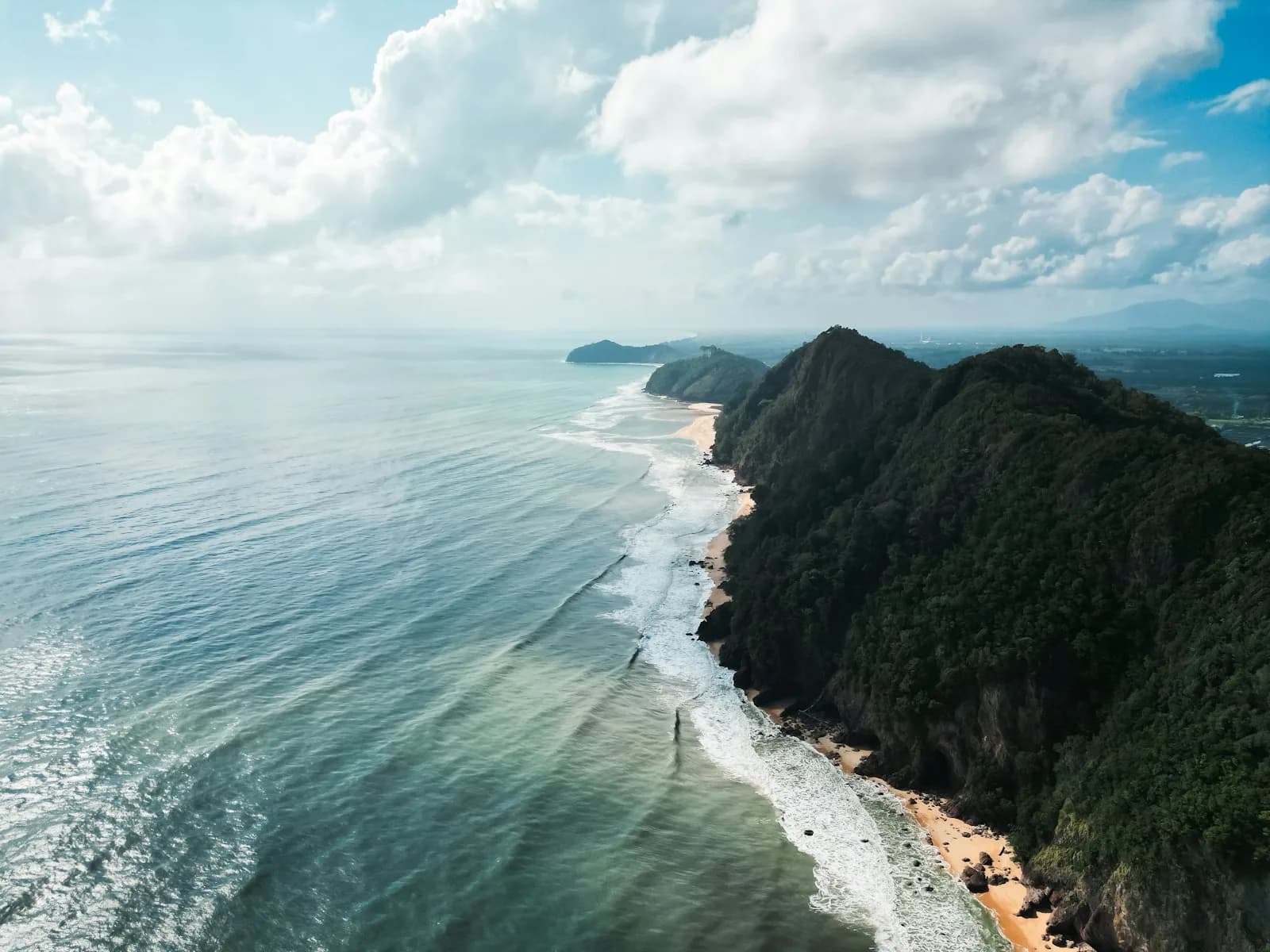 The turquoise water and jungle-backed beaches of the Perhentian Islands