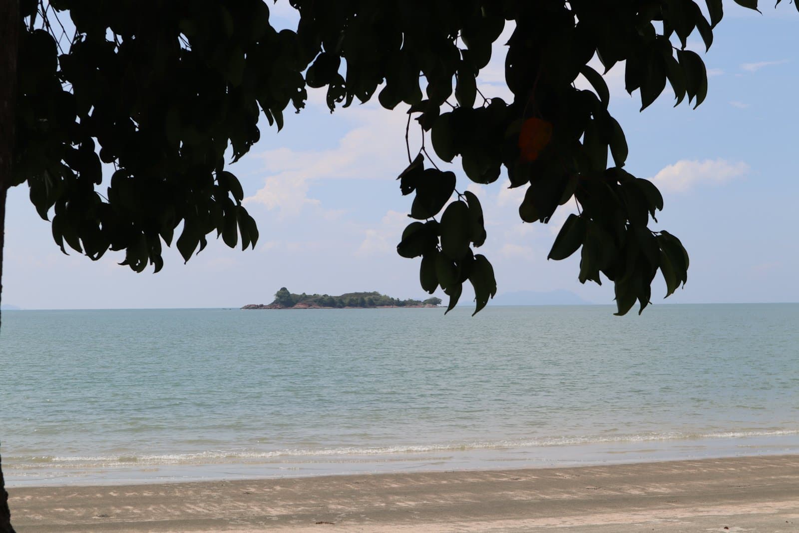 A wide sandy beach on the Desaru Coast