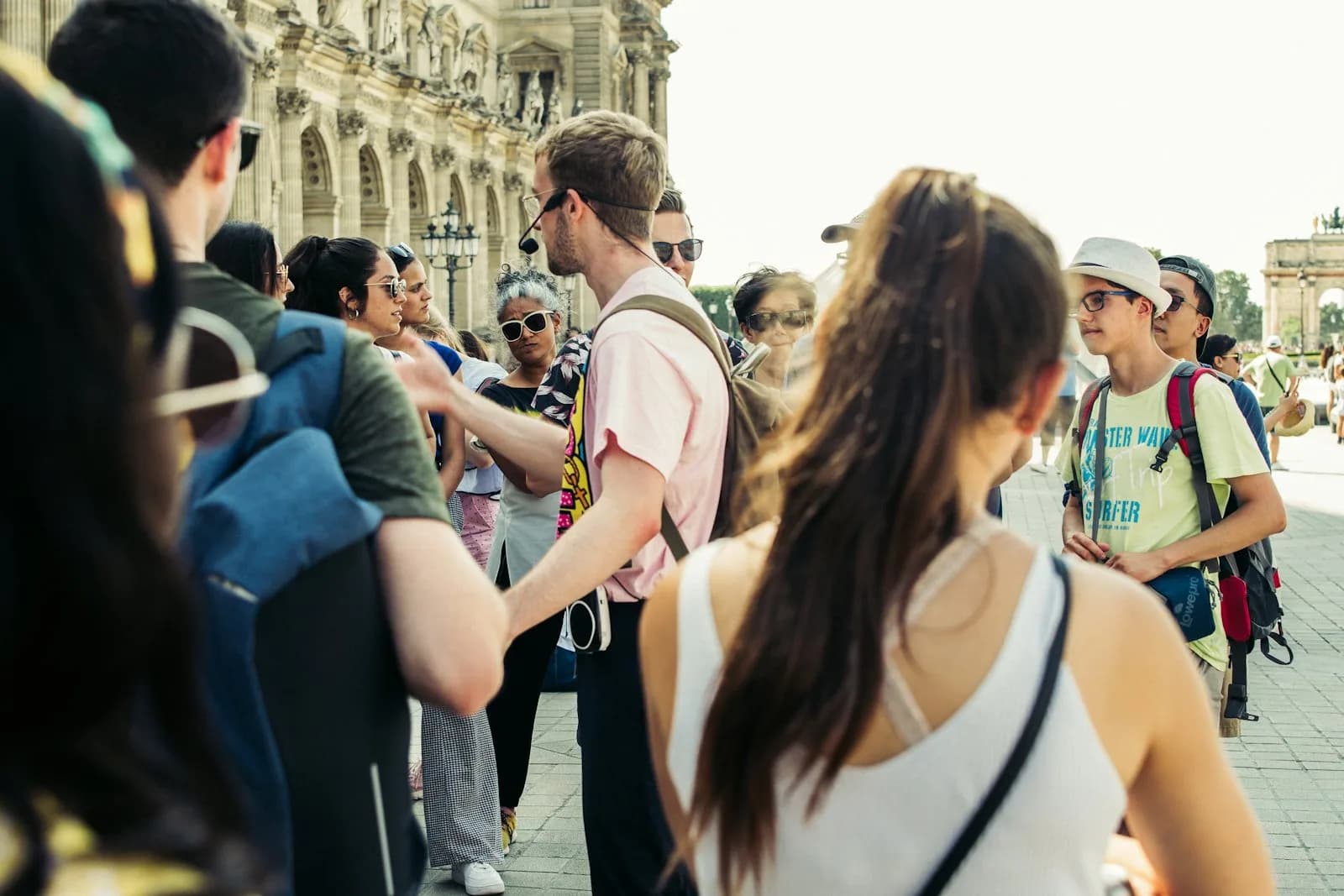 A small tour group with a local guide on a heritage walk