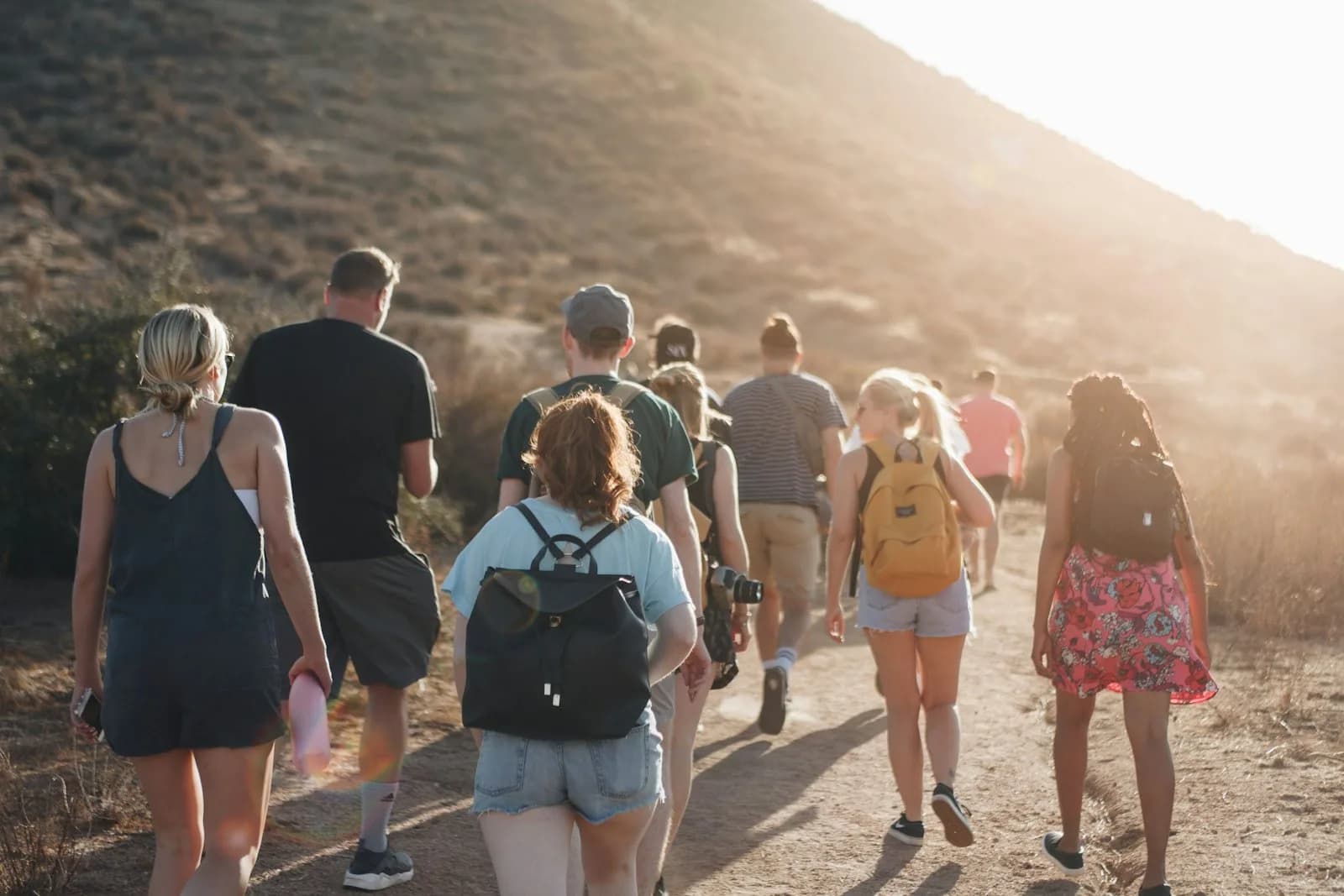 A small tour group with a local guide on a coastal walk