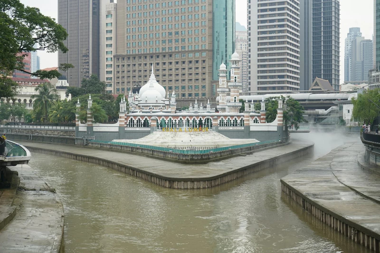 The Masjid Jamek mosque where the Klang and Gombak rivers meet in central Kuala Lumpur, with the city towers behind