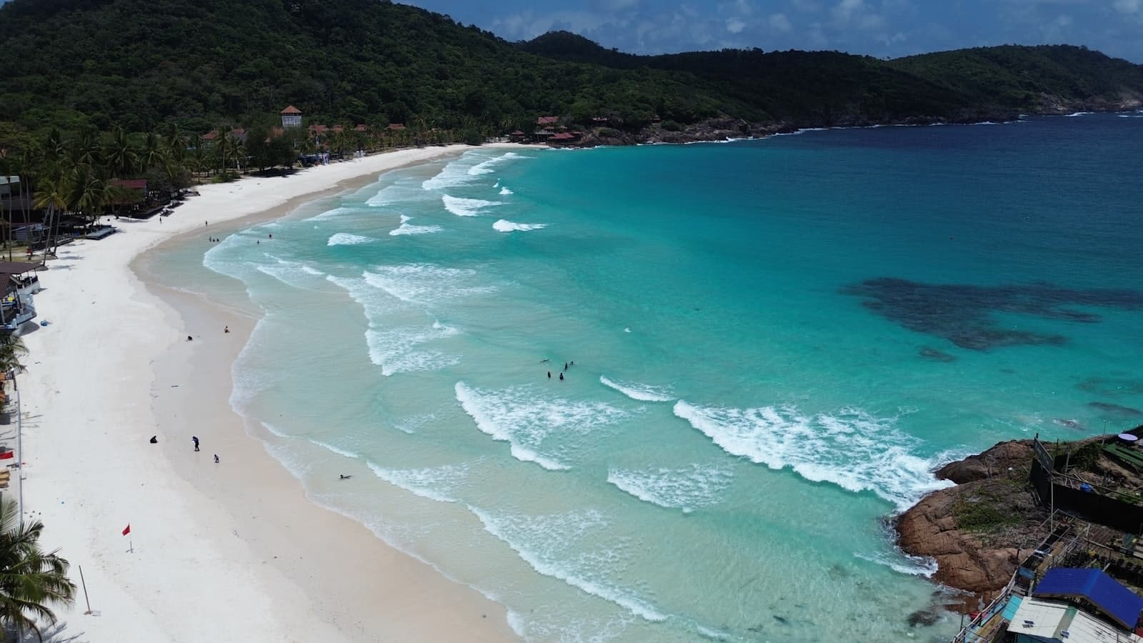 The sandy beach and ocean at Redang